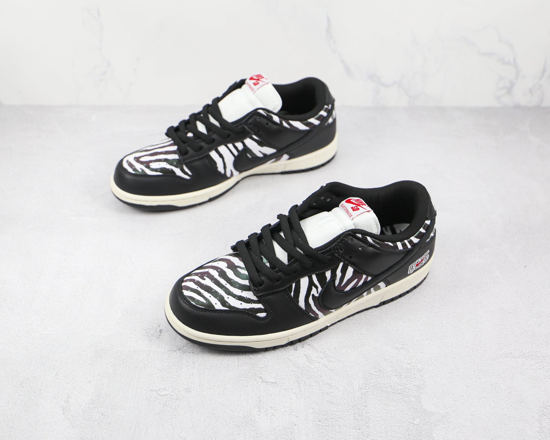 Nike SB Dunk Low Quartersnacks Zebra